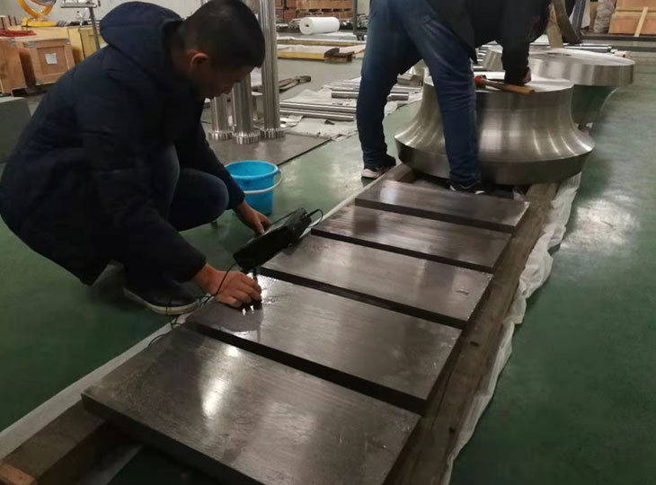 Ultrasonic testing of titanium plates
